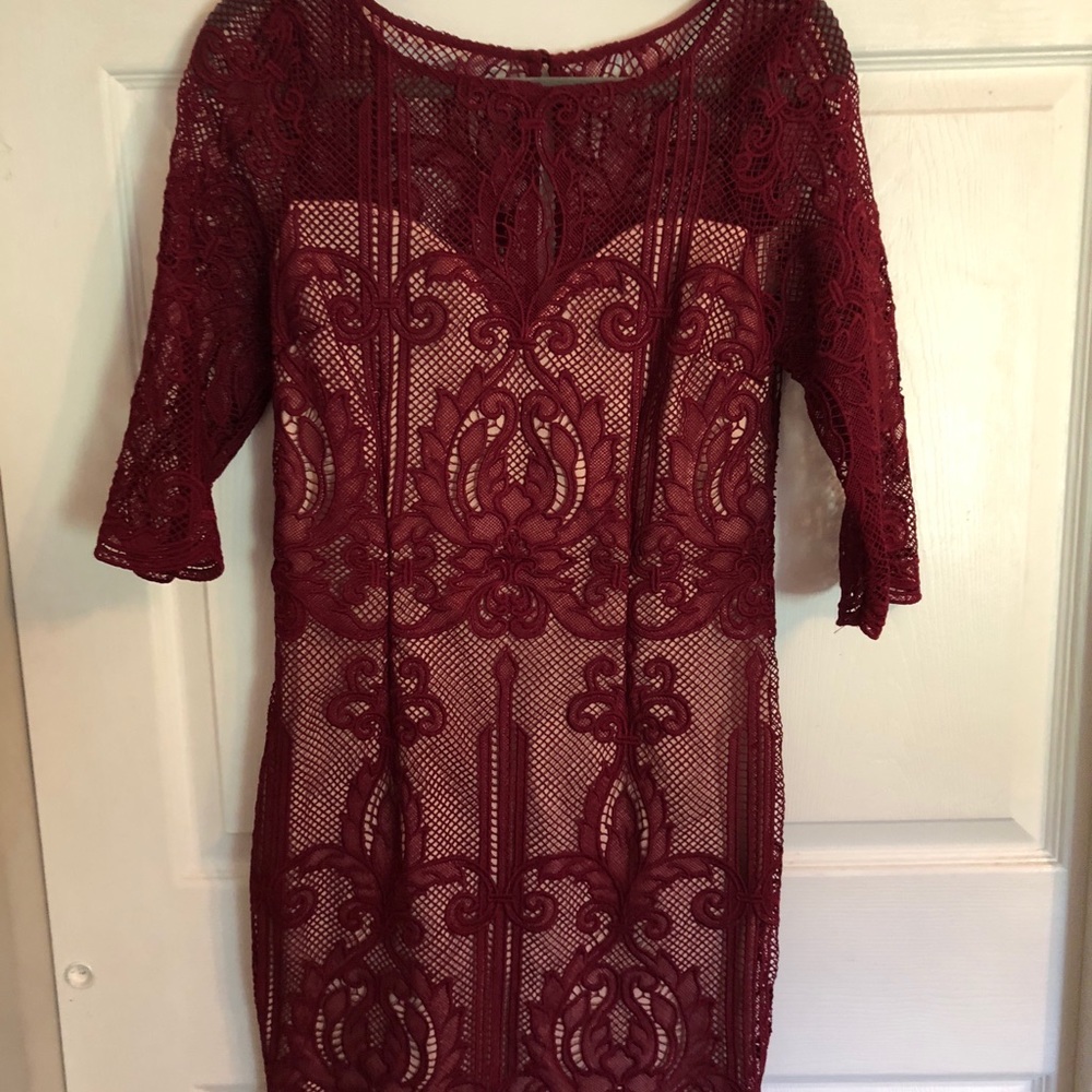 Wine red color dress.